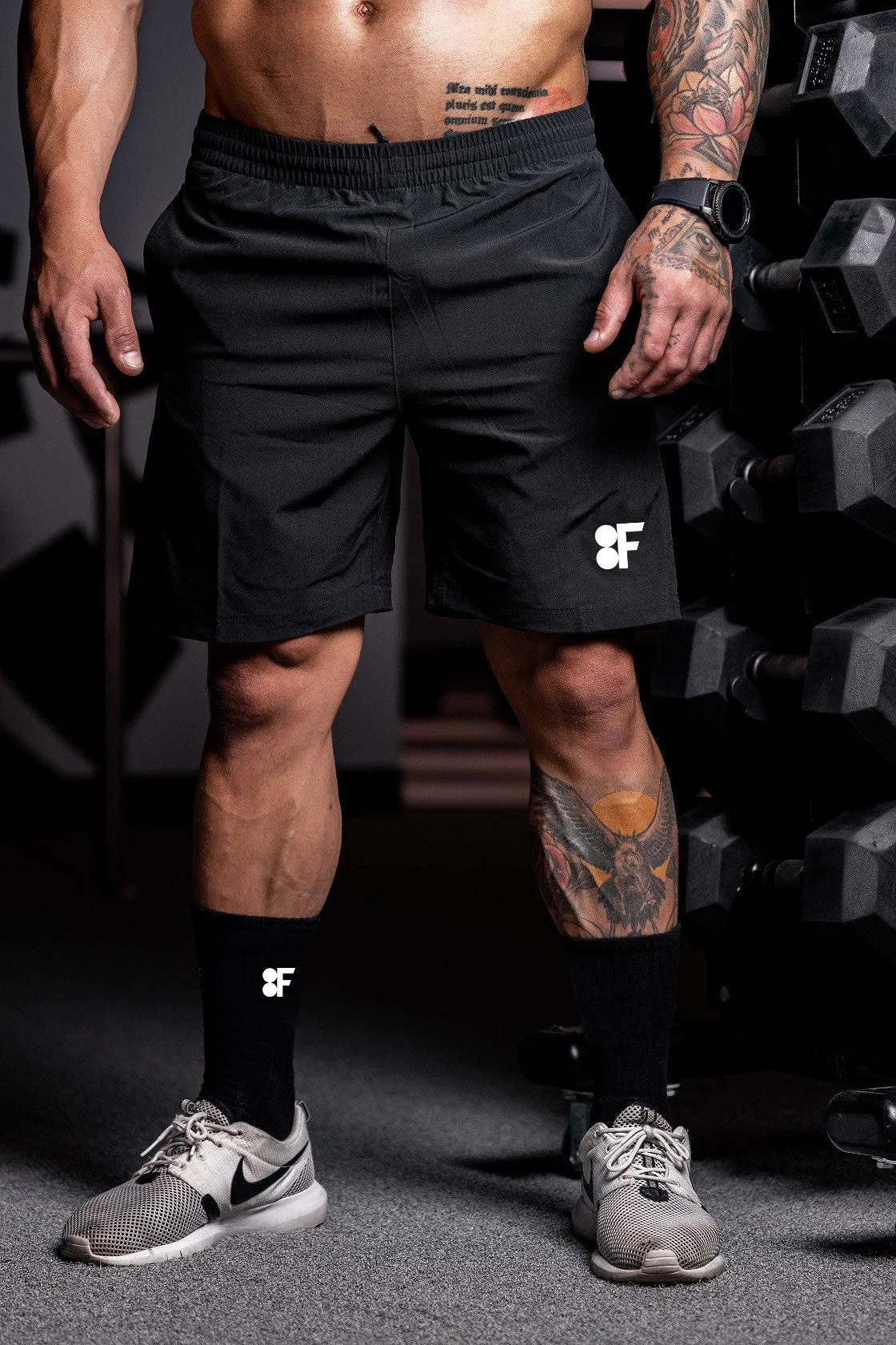 MEN'S LOGO PRINT MID-WAIST RUNNING SHORTS.